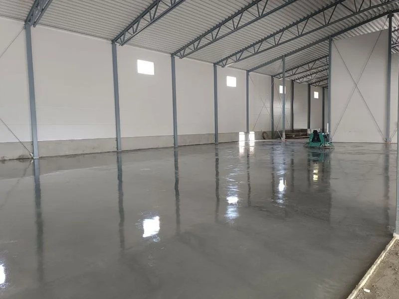 Finished concrete floor coated with varnish